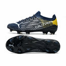Chuteira Puma Ultra 1.3 Campo FG - Preto/Amarelo