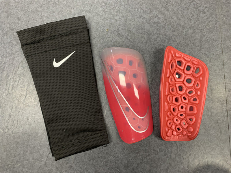 Caneleira Com o Porta Caneleira Nike
