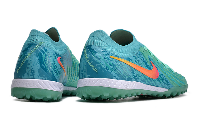 Chuteira Nike Phantom GX 2 Elite Society TF "Vortex"